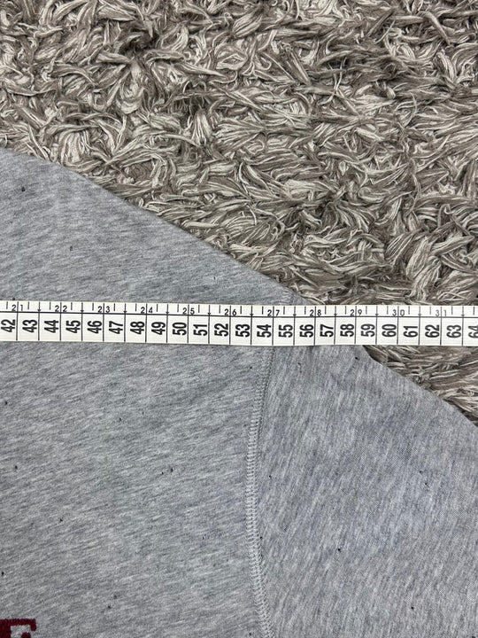 Gucci T-shirt traforata con scritta rossa